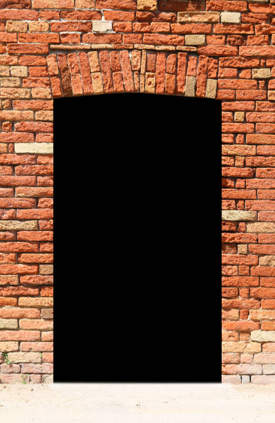 istock wall with a black entrance to the dark unknown 910371252