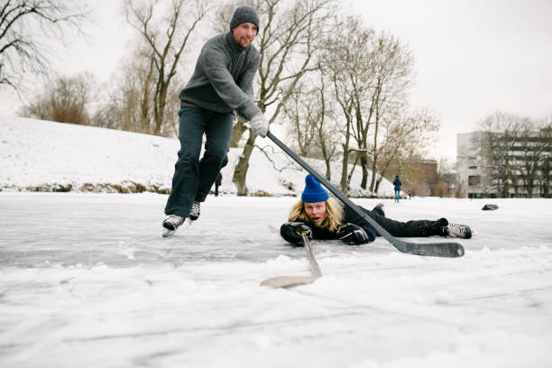 istock Friends playing hockey 910374884