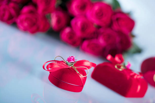 Valentines day concept background. Roses, gifts, romantic decorations. Place for text.