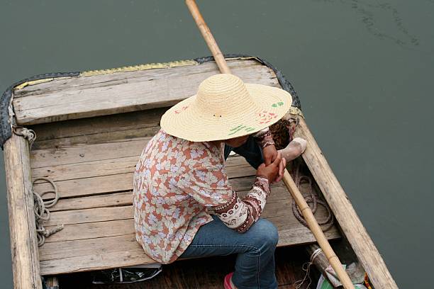 istock Asian girl on a boat 91037564