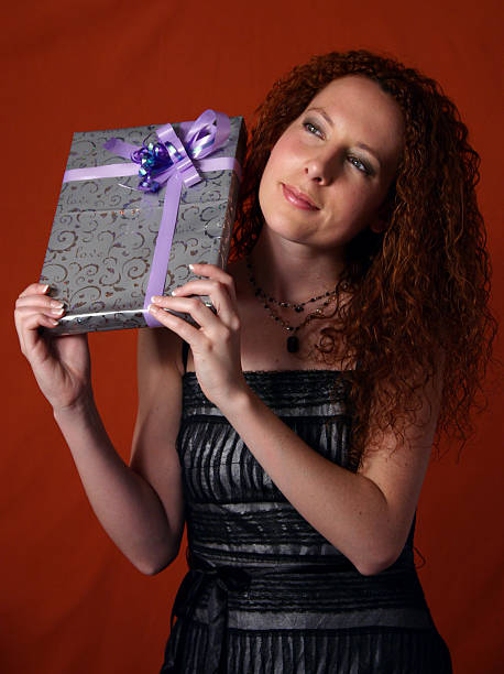 istock woman with a gift 91039319