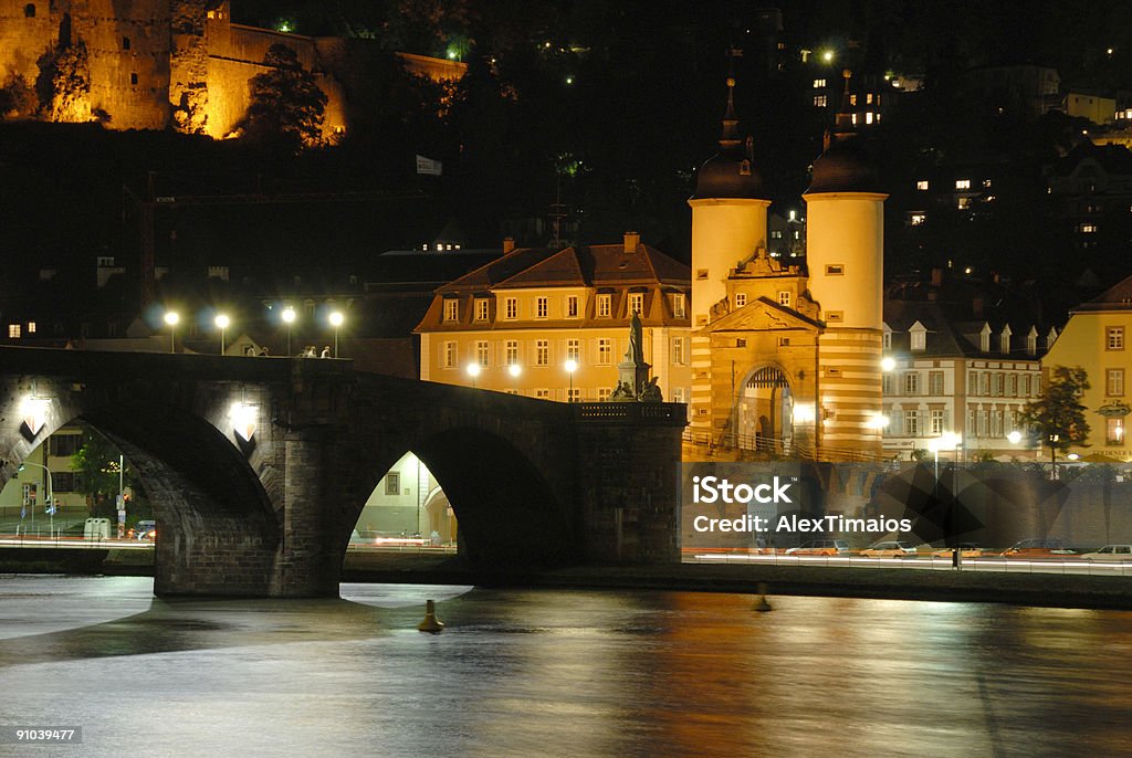 Il ponte storico di Heidelberg di notte - Foto stock royalty-free di Ambientazione esterna