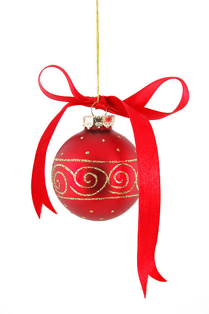 istock Ribbon on red christmas ball hanging over white 91039931