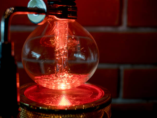 istock Siphon vacuum coffee maker, preparation, close up shot 910406666