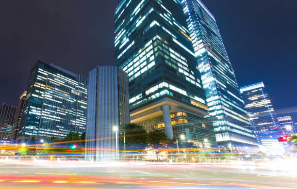 istock modern buildings near busy road 910407822