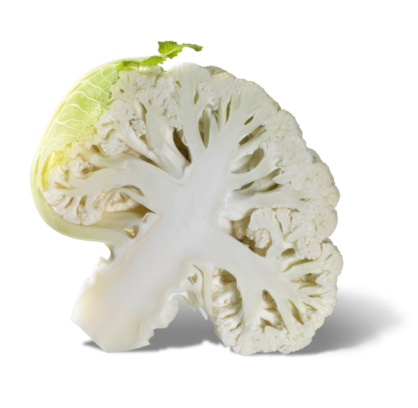 studio shot of a halved cauliflower isolated on white, with clipping path