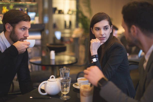 istock Young businesspeople working in restaurant 910419448