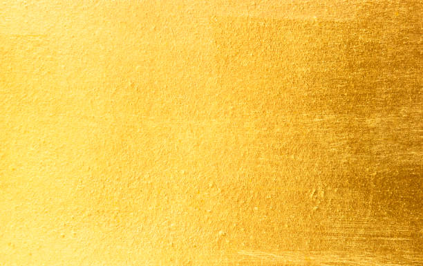 istock Shiny yellow leaf gold foil texture 910423438