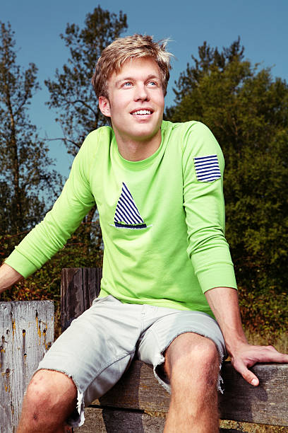 istock Smiling Blonde Guy Outdoors Portrait 91042710