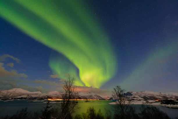 istock Aurora Northern Polar light in night sky over Northern Norway 910427268