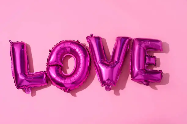 Photo of letter-shaped balloons forming the word love