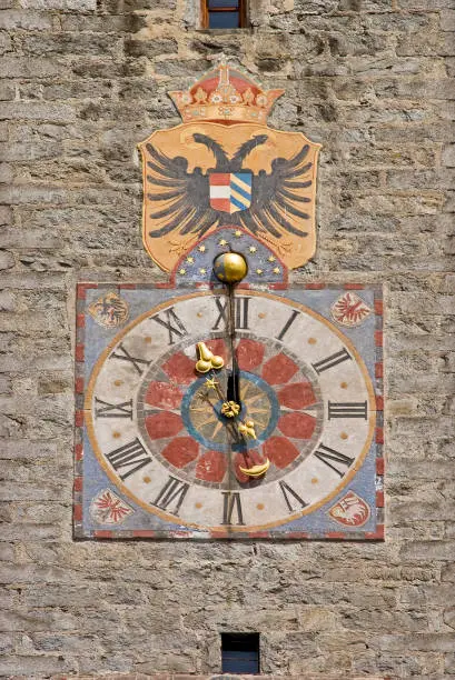 Old clock At the tower of the city gate in Vipiteno in South Tyrol