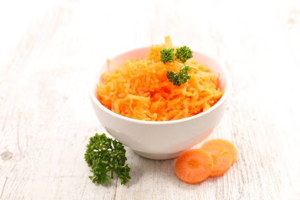 istock bowl of grated carrot 910431902