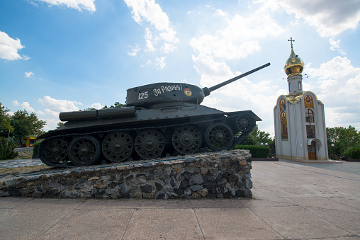 TIRASPOL, TRANSNISTRIA - CIRCA AUGUST 2016: Parliament building and tank. Tiraspol is the capital of Transnistria, a self governing territory not recognised by United Nations