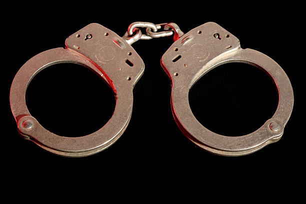 Tarnished Handcuffs stock photo