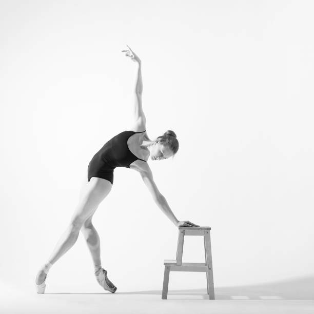 istock Ballerina in overalls on a white background 910452894