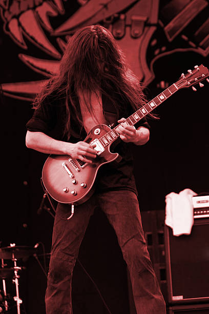 istock Long hair guitarist 91045491