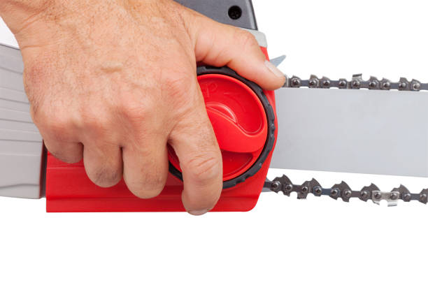 istock Chain tension on the electric saw 910456288