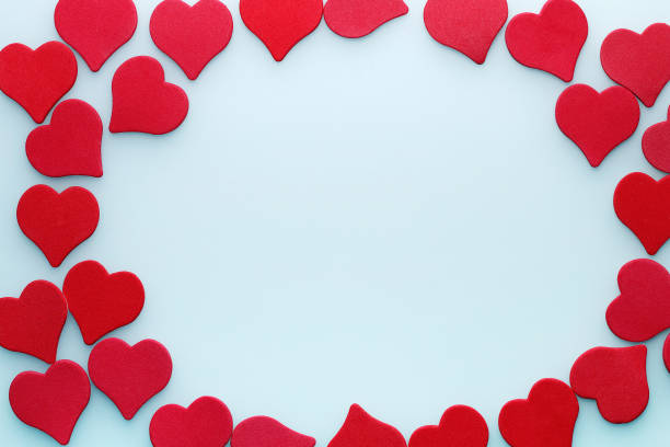 istock Background for St. Valentine's Day  Frame of red hearts on white background 910457208