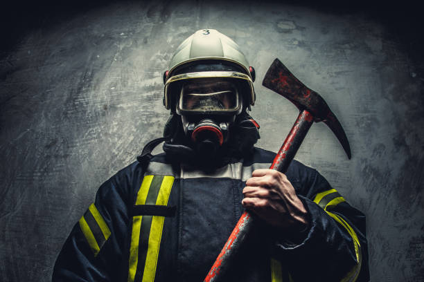 istock Rescue man in firefighter uniform. 910457894