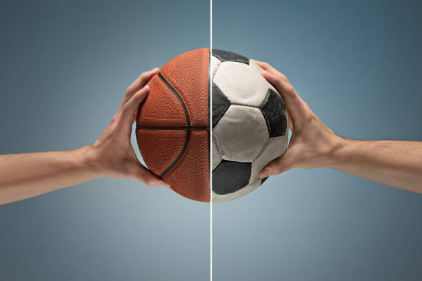 istock Hands holding soccer ball 910461336