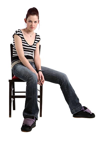 istock Young woman sitting on a chair 91046313