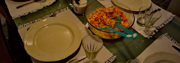 istock plates and home made salad on a table 910467862