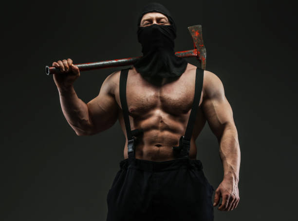 istock Muscular firefighter with naked torso 910468952