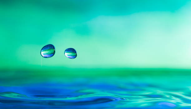 istock Water droplet splash photograph 910472252