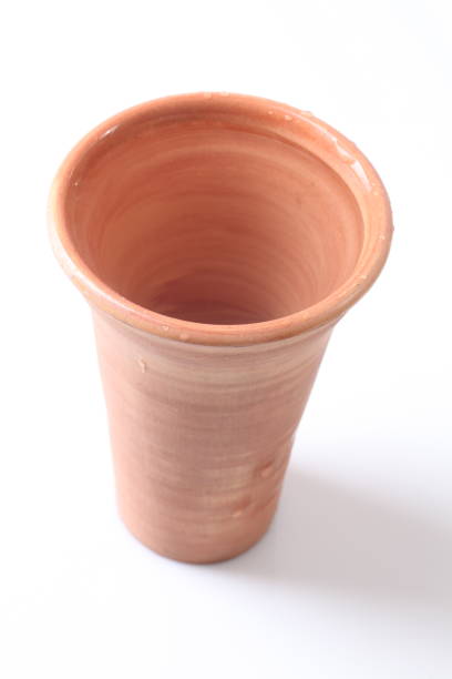 istock clay glass with milk 910475196