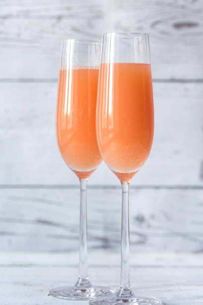 istock Two glasses of bellini cocktail 910481032