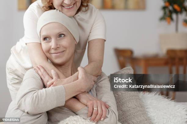Family Member Supporting Sick Woman Stock Photo - Download Image Now - Cancer - Illness, Patient, Oncology