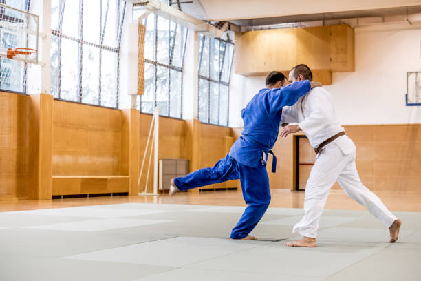 istock Two Adult Judoists Fighting 910485082