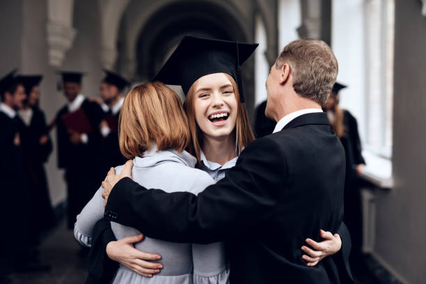 istock Parents congratulate the student, who finish their studies at the university. 910488438