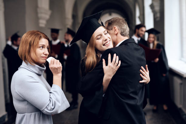 istock Parents congratulate the student, who finish their studies at the university. 910488446