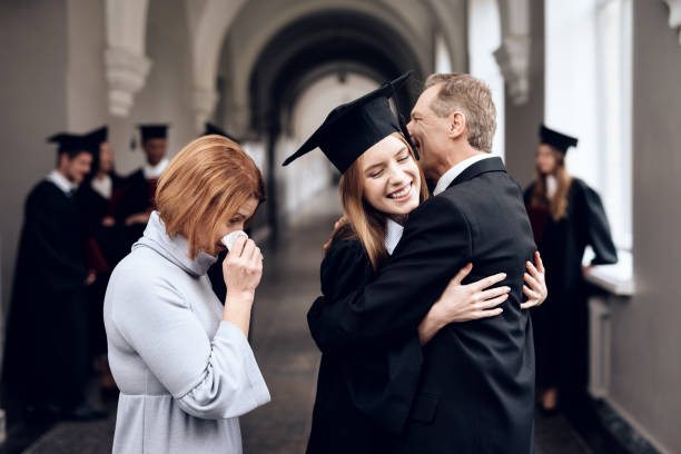 istock Parents congratulate the student, who finish their studies at the university. 910488452