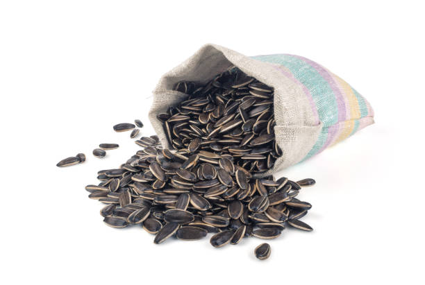 Sunflower seeds in a bag isolated on white background