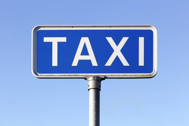Blue taxi sign