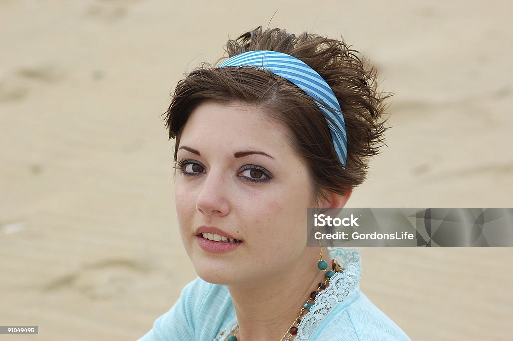Sitting at the Beach  Adult Stock Photo