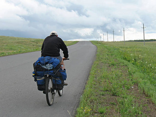 istock One cyclist go to road. 91049693