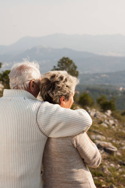 istock senior couple looking at the landscape 910500166