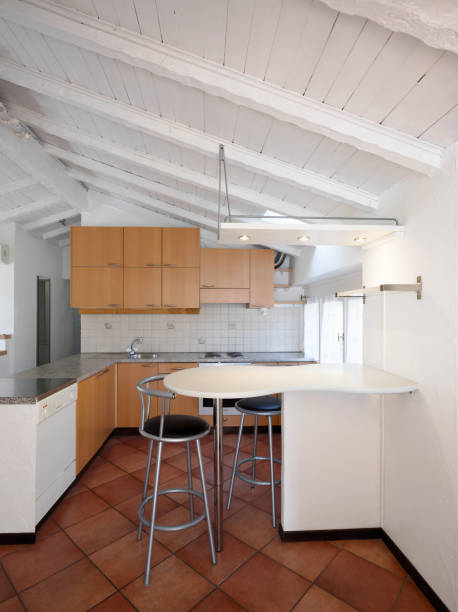istock Vintage wooden kitchen and stools 910503456