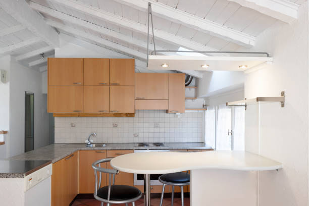 istock Vintage wooden kitchen and stools 910503596