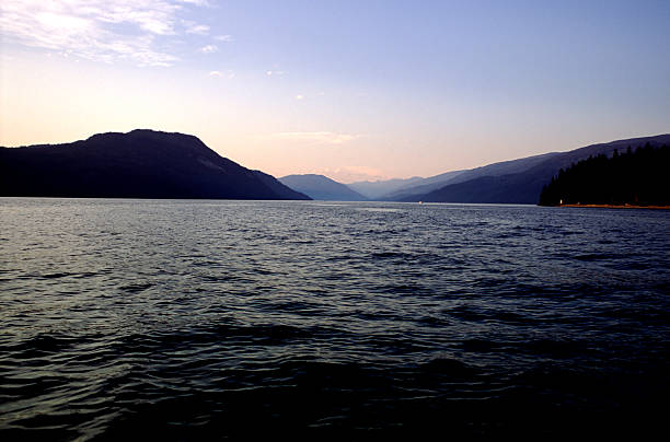 istock Sun Slipping Behind the Mountains 91050495