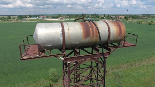 istock The water tower. An old rustic communal communication. The water tower 910511422