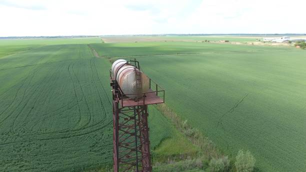 istock The water tower. An old rustic communal communication. The water tower 910511466