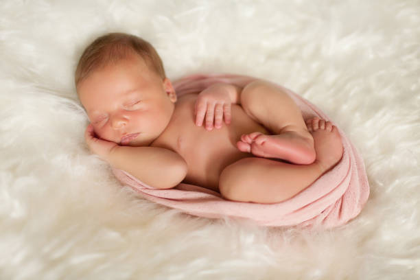 istock Sleeping newborn girl 910517380