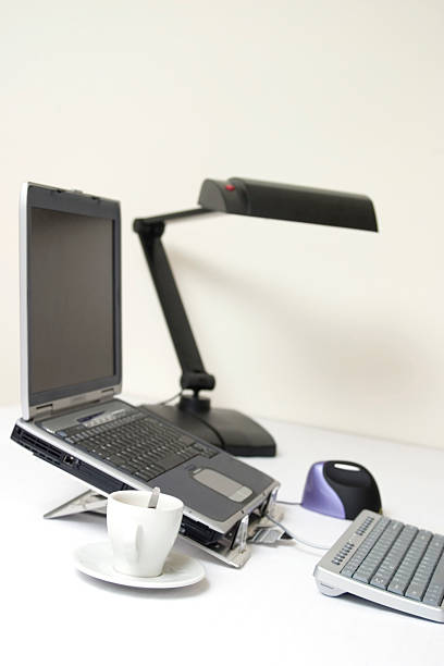 istock white office desk with notebook, keyboard, mouse and coffee cup 91052137