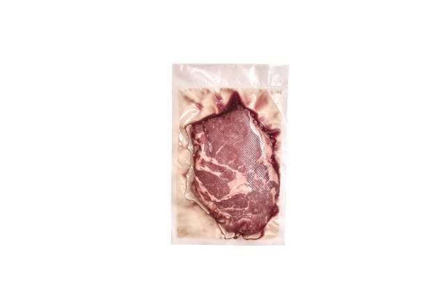 istock Unopened pack of 1 raw beef steaks isolated on white background 910528302