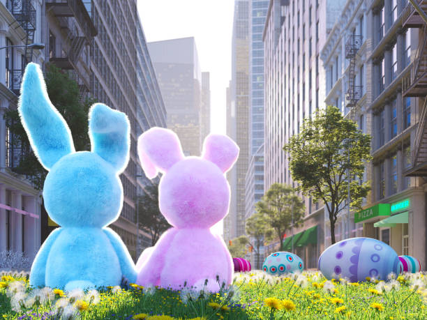 istock two rabbits sitting in lawn with easter eggs infront of big city. 3d rendering 910528636